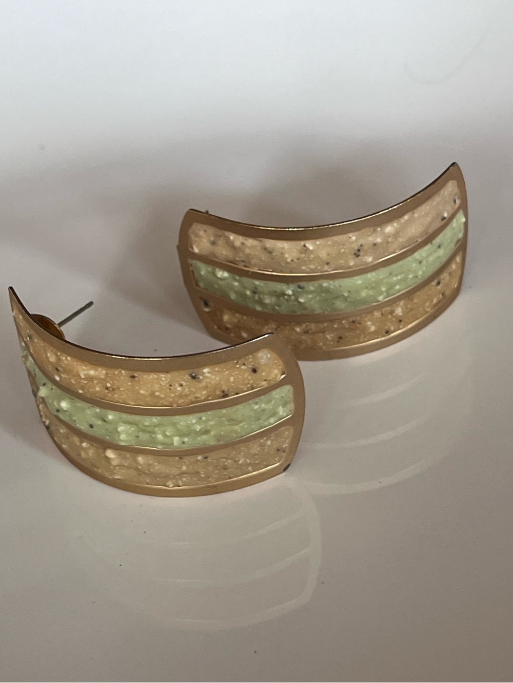 Gold-Tone Curved Stud Earrings with Green and Cream Resin Inlay